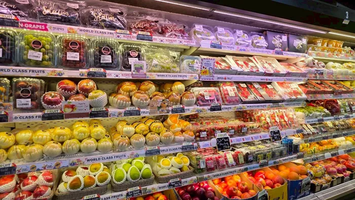 Imported fruit wall with grapes, cherries, apples and citrus at Villa Market Thonglor